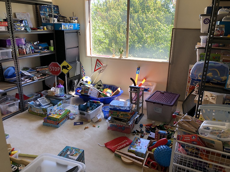 decluttering before and after toyroom before