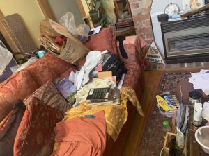 Things that make your home look cluttered - messy couch