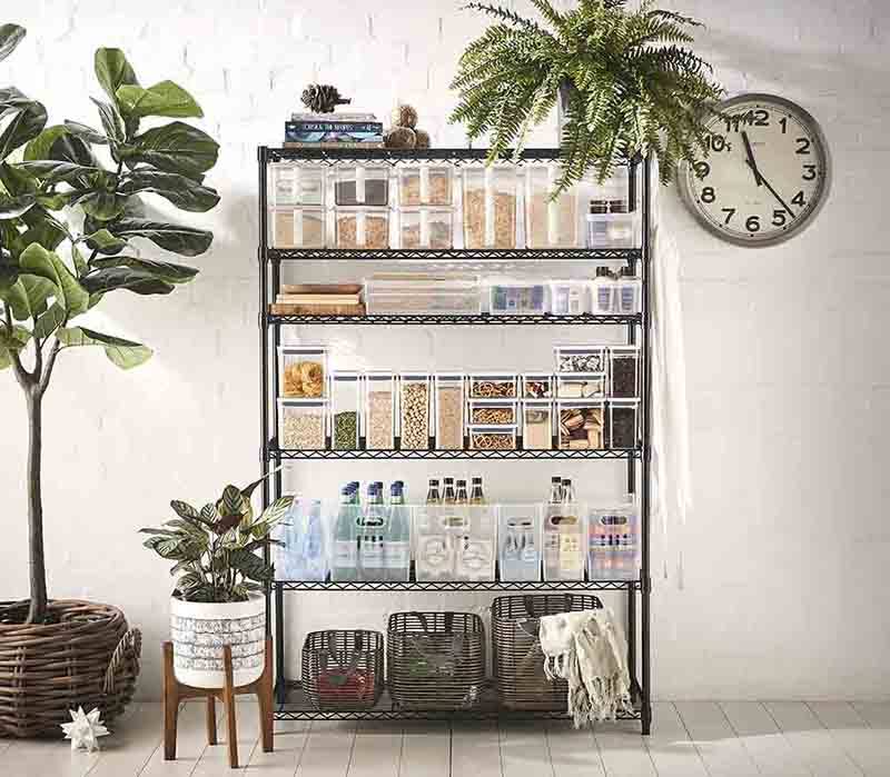 space in the kitchen is created with organised tubs